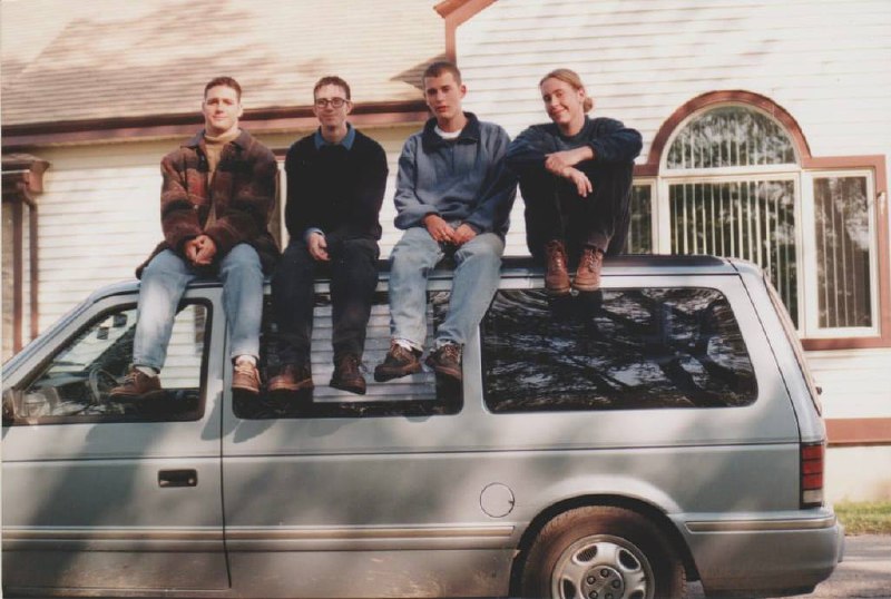 Capgun band photo on a car